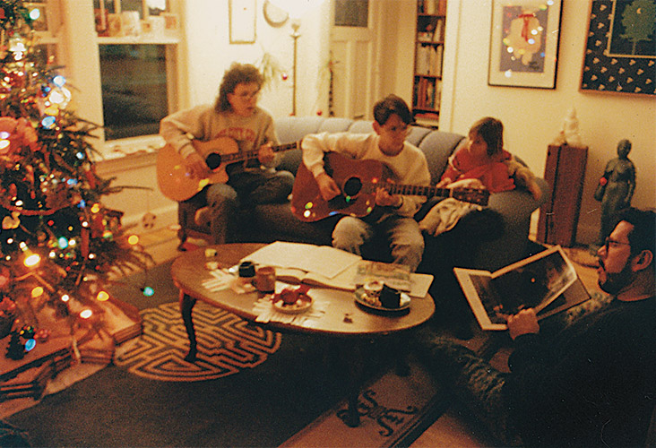Michael reading Polar Express, accompanied