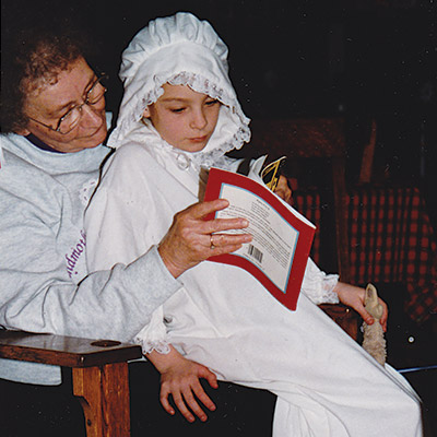 Jane's Grandma reading to her in American Girl Felicity's nightgown 