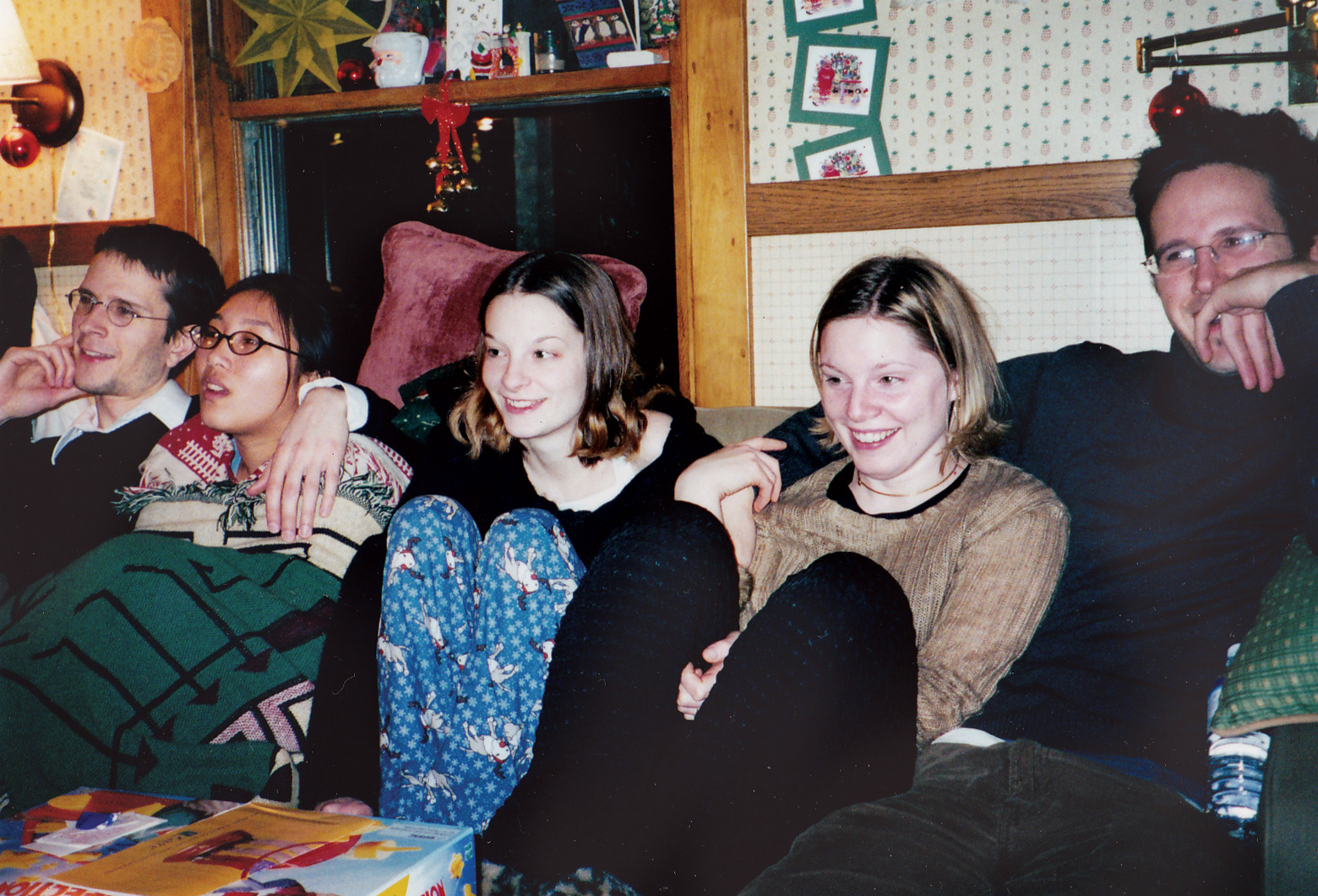 Watching a movie. Smiles. Matt, Xia, Jane, Amy, and Mason.