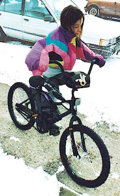 Jane on a custom bike