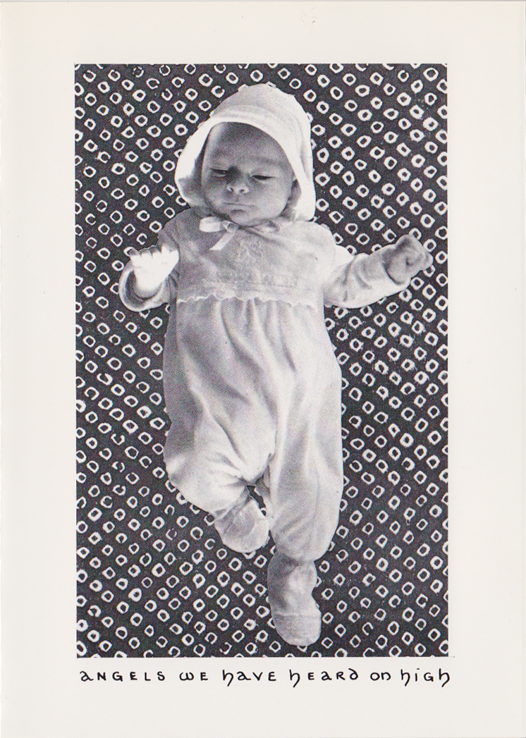 Photo of baby Jane on a dotted background. "Angels we have heard on high"