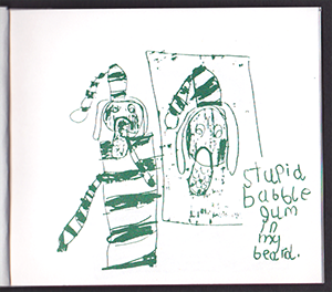 Another page above is open, with a drawing from the movie.