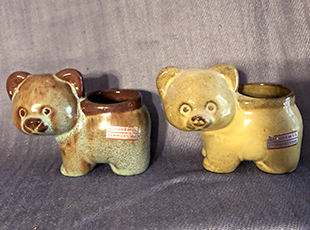 Two Ellen Jennings bear cactus planters with different Nikodemus glazes