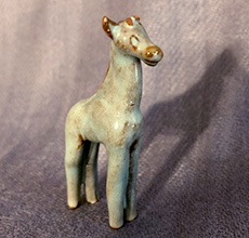 Tiny Ellen Jennings giraffe with horns and one ear missing