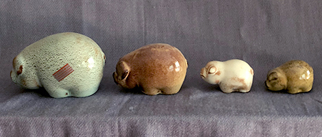 Four different Ellen Jennigns pigs