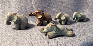 Five tiny Ellen Jennings elephants