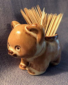 Ellen Jennings bear holding toothpicks