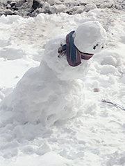 snowman leans and loses his arms