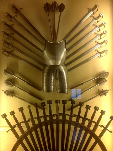 museum display of mideval armor and weapons
