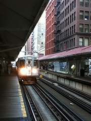 elevated train pulling into station