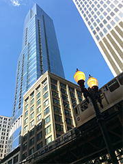 el with skyscrapers and street light