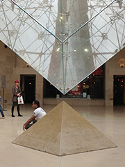 under the pyramid in the Louve courtyard