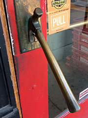 bronze hammer as door knob