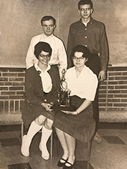 my high school debate team yearbook picture, with award
