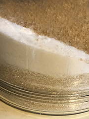different sugars in a glass jar