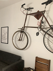 my daughter's tall bike mounted as decoration in her apartment