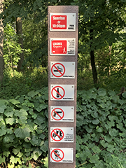 park sign post in park