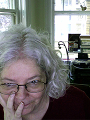 woman staring at computer screen