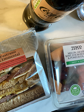Sandwich and fruit salad in Tesco packaging