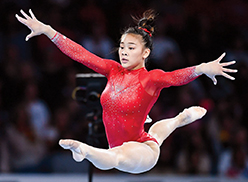 Suni Lee leaping at Olympics