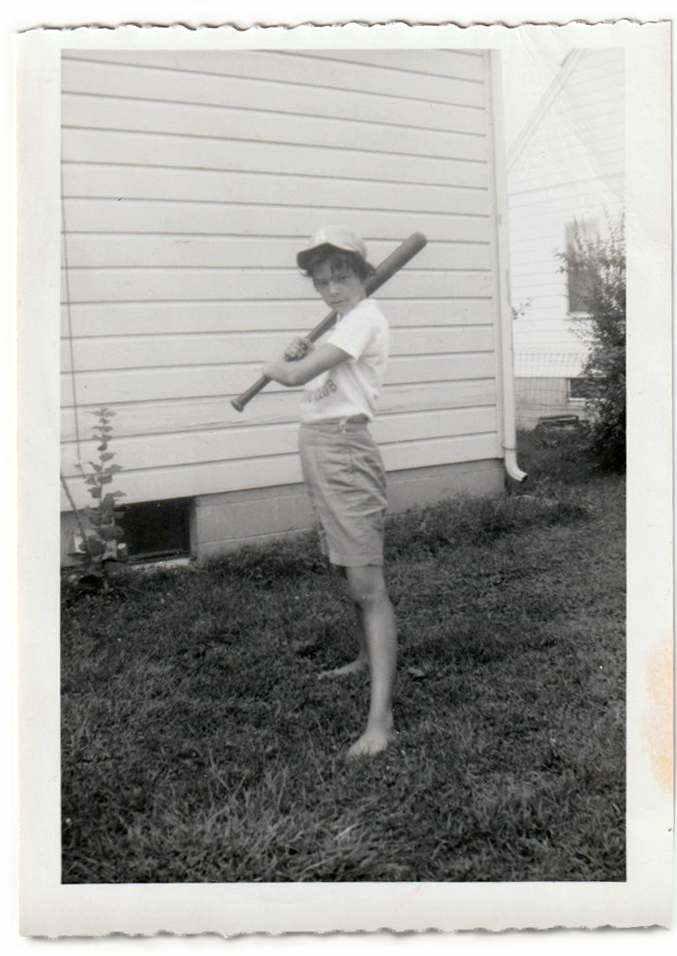 girl (me) looking ridiculous holding a bat