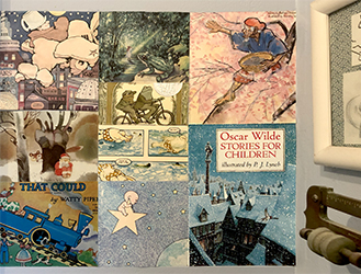 Wallpaper strip made of children's book jackets shown in corner by scale