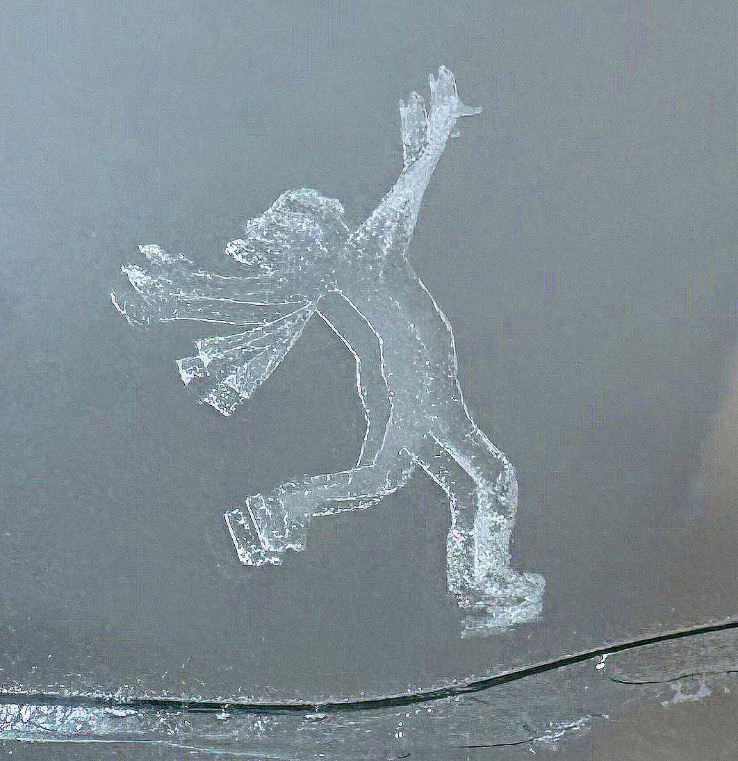 Skater etched in broken mirror