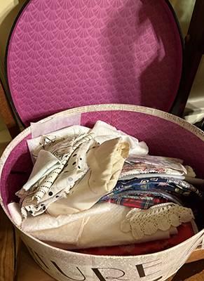 Hatbox full of fabric