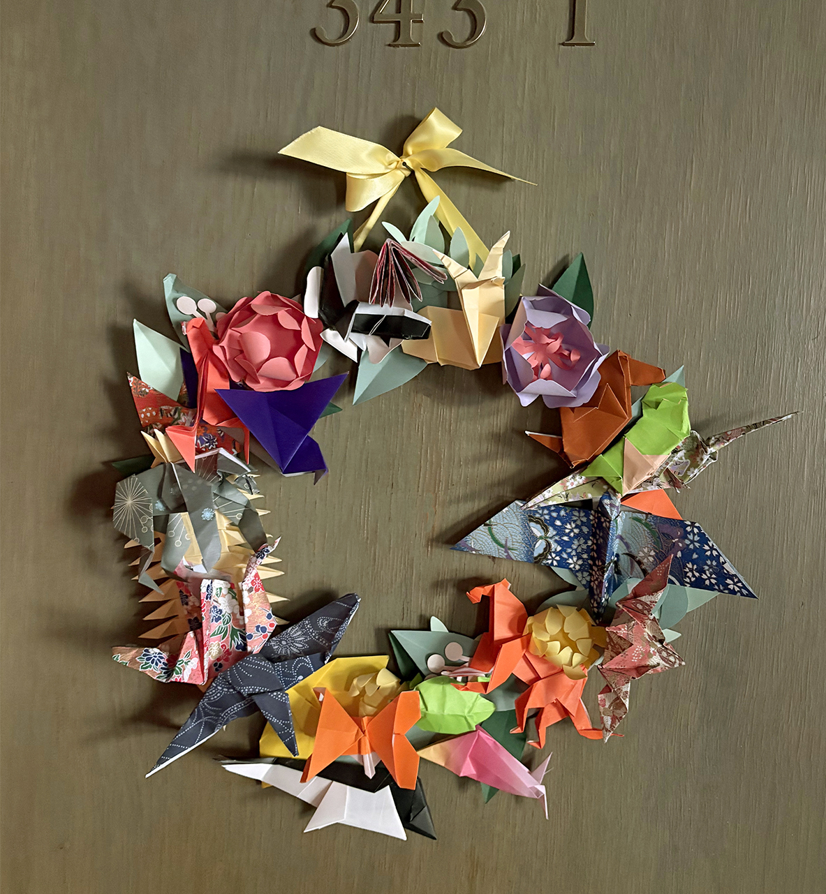 Wreath full of paper animals